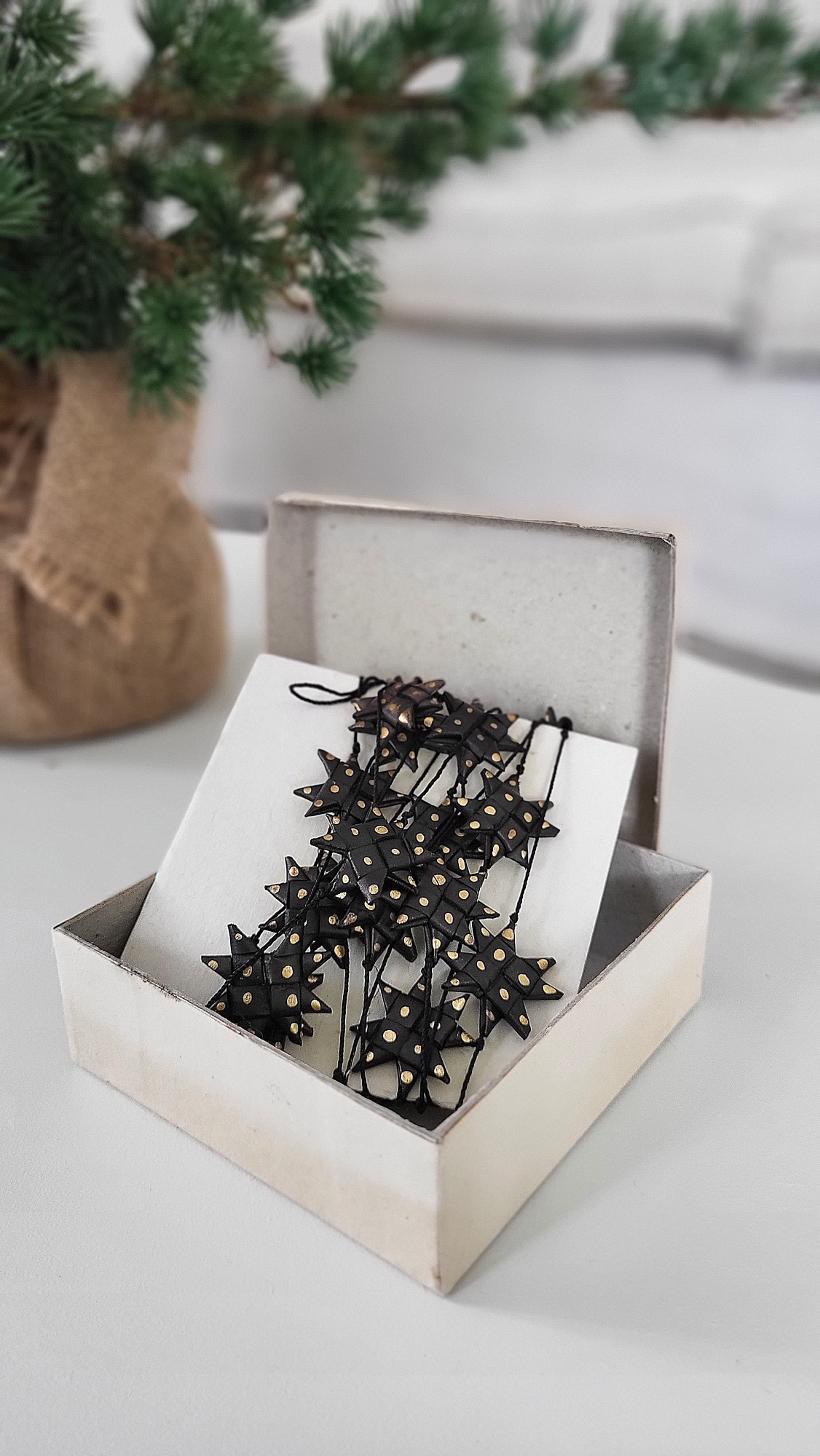 Sterrenslinger zwart en goud