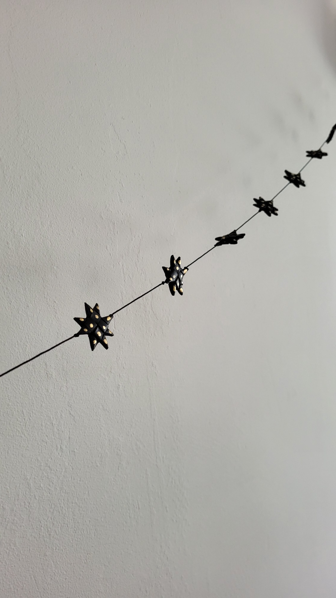 Sterrenslinger zwart en goud