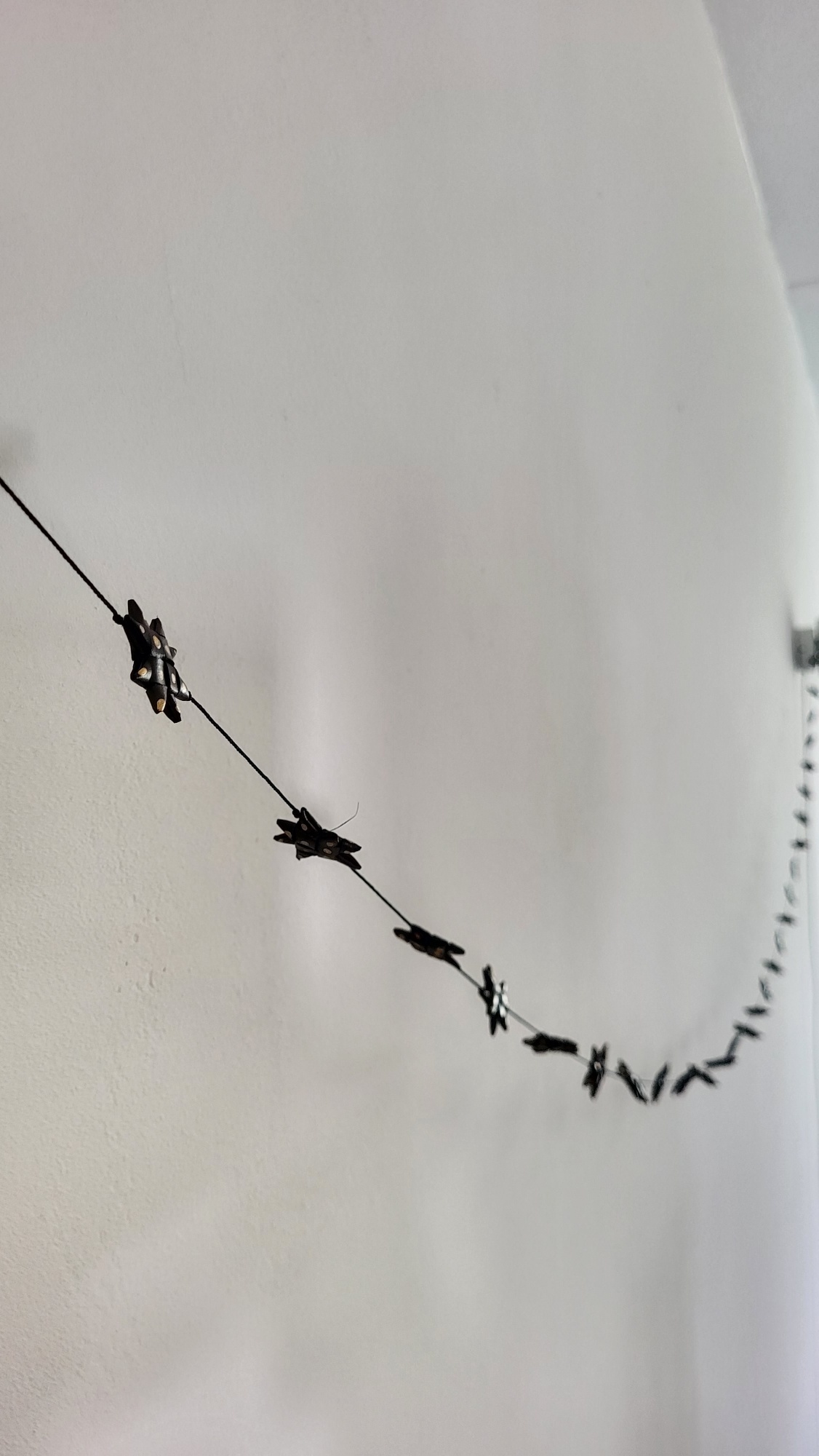 Sterrenslinger zwart en goud